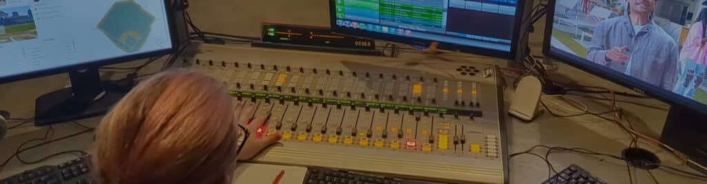Person working on a sound board