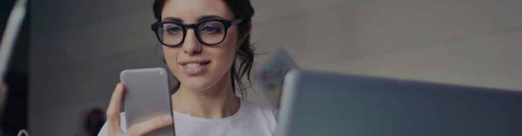 Woman working on her phone.